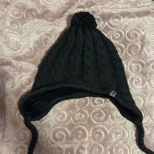 Warm lined black hat with pom poms